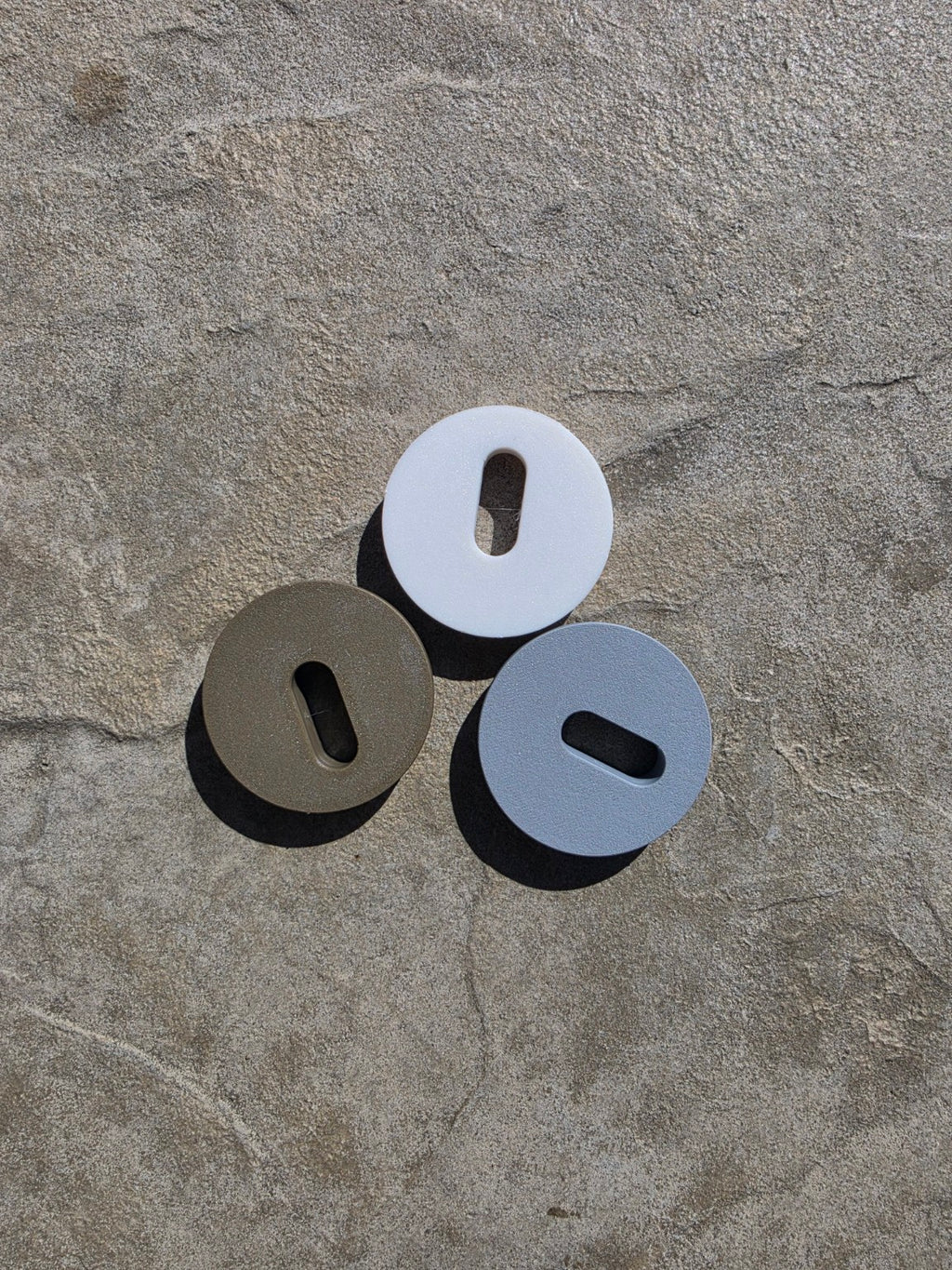 Three MRKSENS replacement deck jet cover plates for compatible Jandy deck jets shown in white, tan, and gray