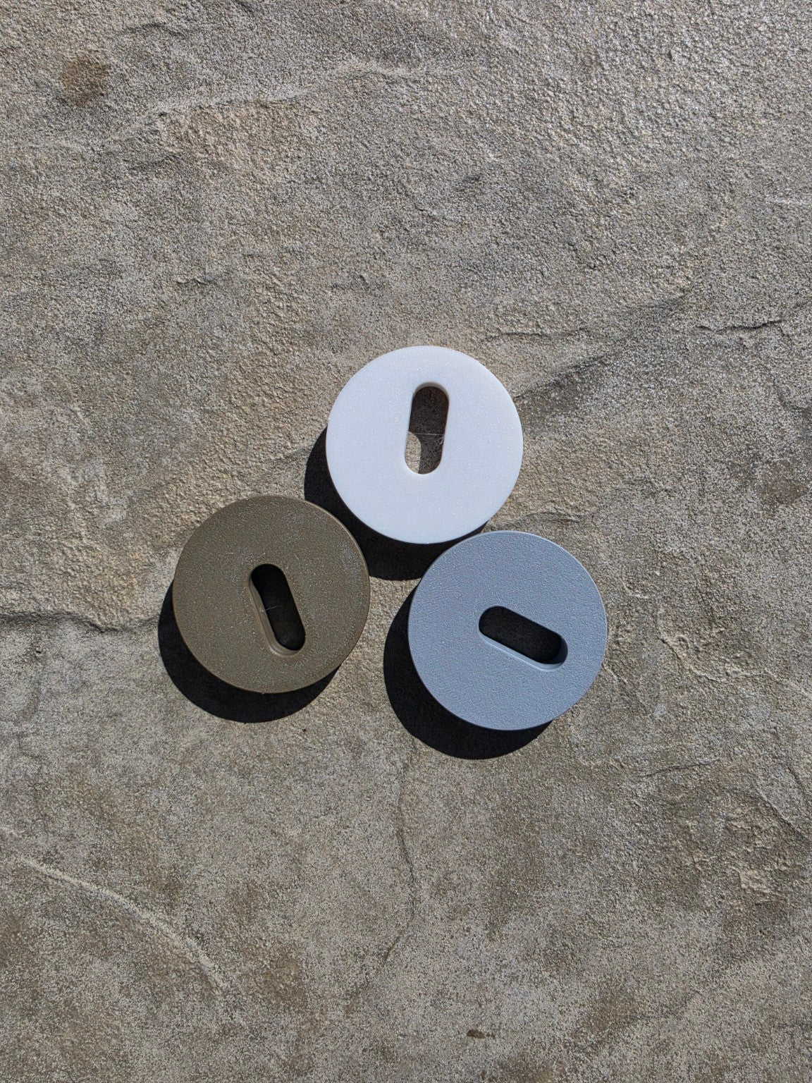 Three MRKSENS replacement deck jet cover plates for compatible Jandy deck jets shown in white, tan, and gray